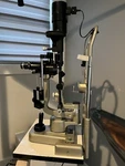 Topcon SL-3D Slit Lamp W/ American Optical Table Power Supply. Fixed Price $1200.00.