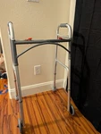 Drive Folding Aluminum Walking Frame With Adjustable Handles, 2 Wheels, Silver. Fixed Price $12.00.