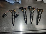 Ford 6.0 Fuel Injector Set Of 4 Good Used Not Core. Fixed Price $300.00.