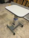 Luxvision Optical Electric Motorized Table Instrument Lift With 4 Wheels. Fixed Price $500.00.
